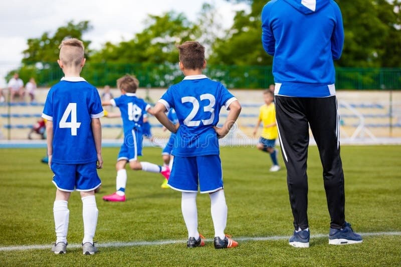Soccer athletes celebrating together